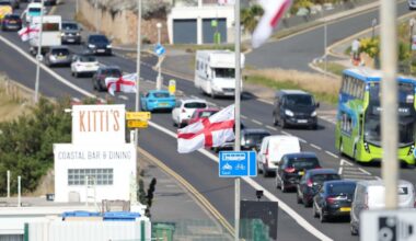 Removal of St George's flags halted after contractors face 'verbal abuse'