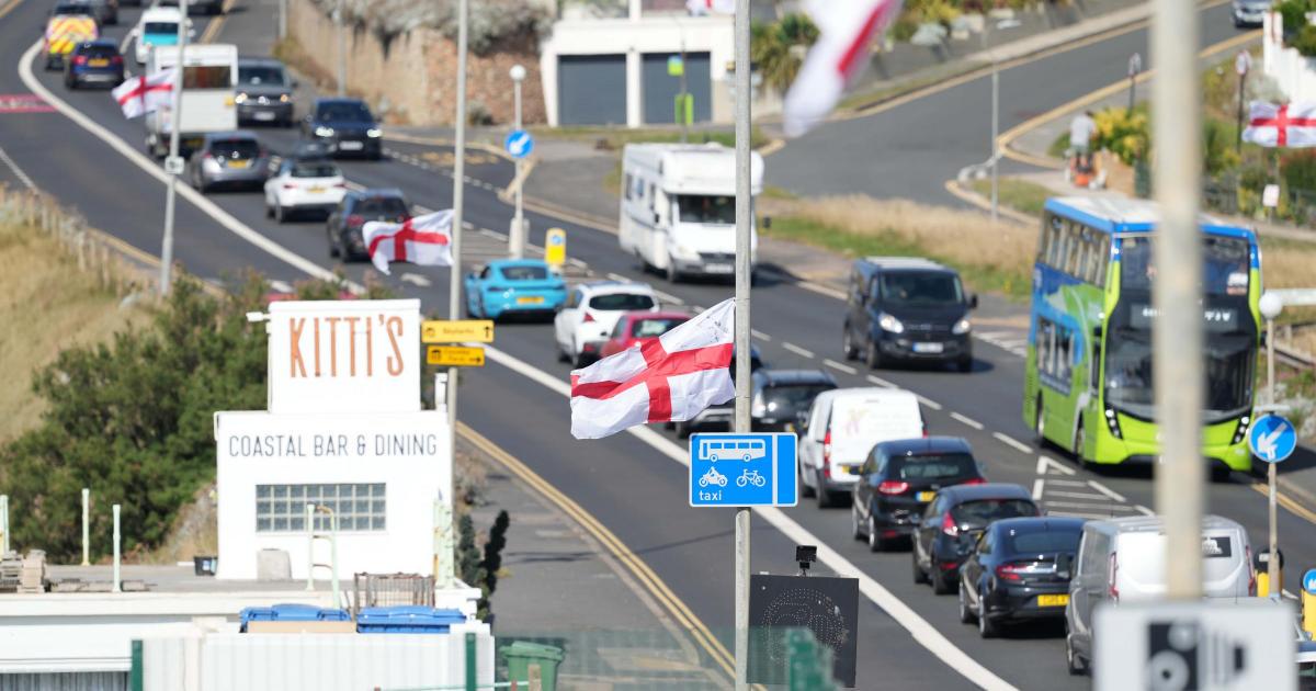 Removal of St George's flags halted after contractors face 'verbal abuse'