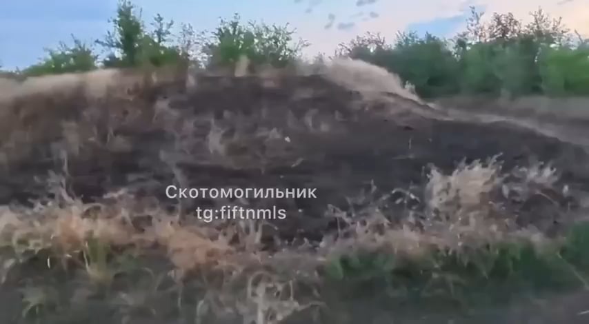 GoPro footage shows a Ukrainian riding in the back of a pickup truck, trying to shoot down a Russian drone with a shotgun.