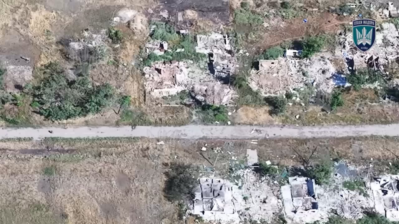 An FPV drone of Ukraine's 414th Strike UAV Brigade kills a Russian soldier riding a scooter down a road, August 2025