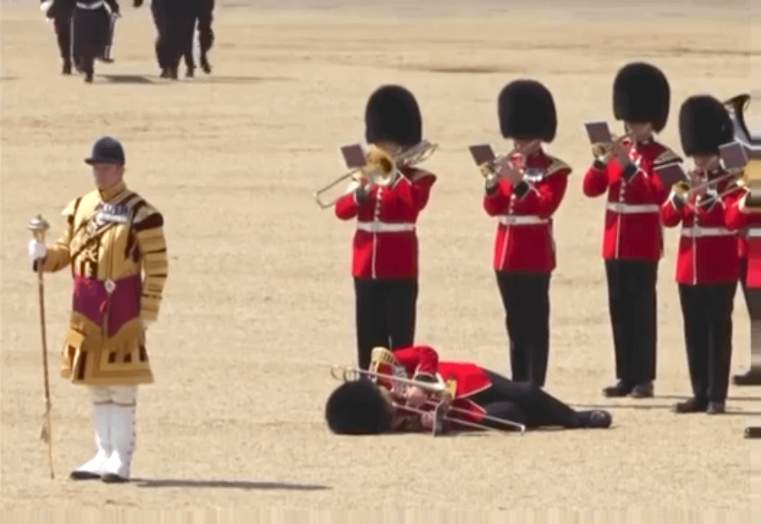 Royal guard faints during Charles' birthday ceremony in 2023 - I like how he starts trying to play again and his friends are like, no...