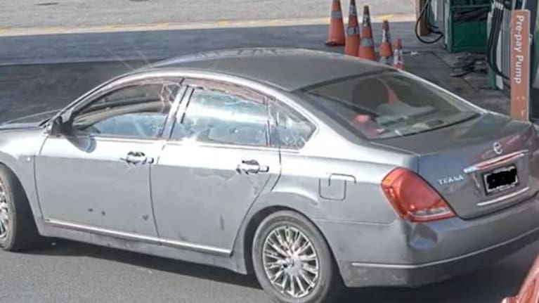 A 2005 grey Nissan Teana.