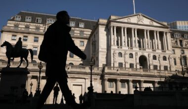 London stocks slip as Bank of England cuts interest rates