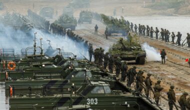 Russian tanks cross the Oka river on rafts during the Zapad-2021 (West-2021) joint Russian-Belarusian drills on September 13, 2021.
