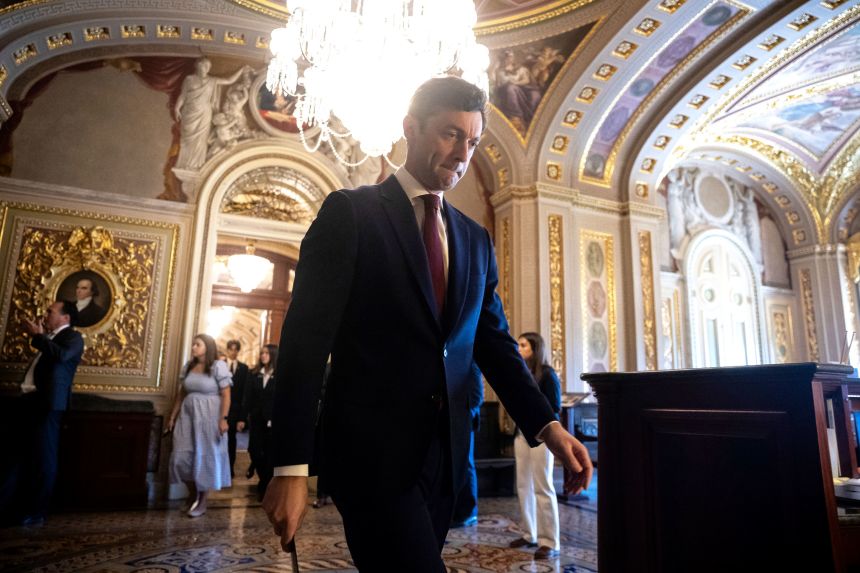 Sen. Jon Ossoff walks to a Senate Democratic Caucus luncheon at the US Capitol, on July 22, 2025.