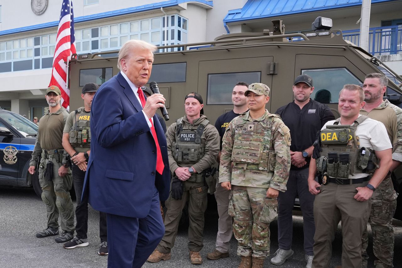 President Donald Trump speaks with members of law enforcement and National Guard soldiers in Washington, DC, on Thursday.