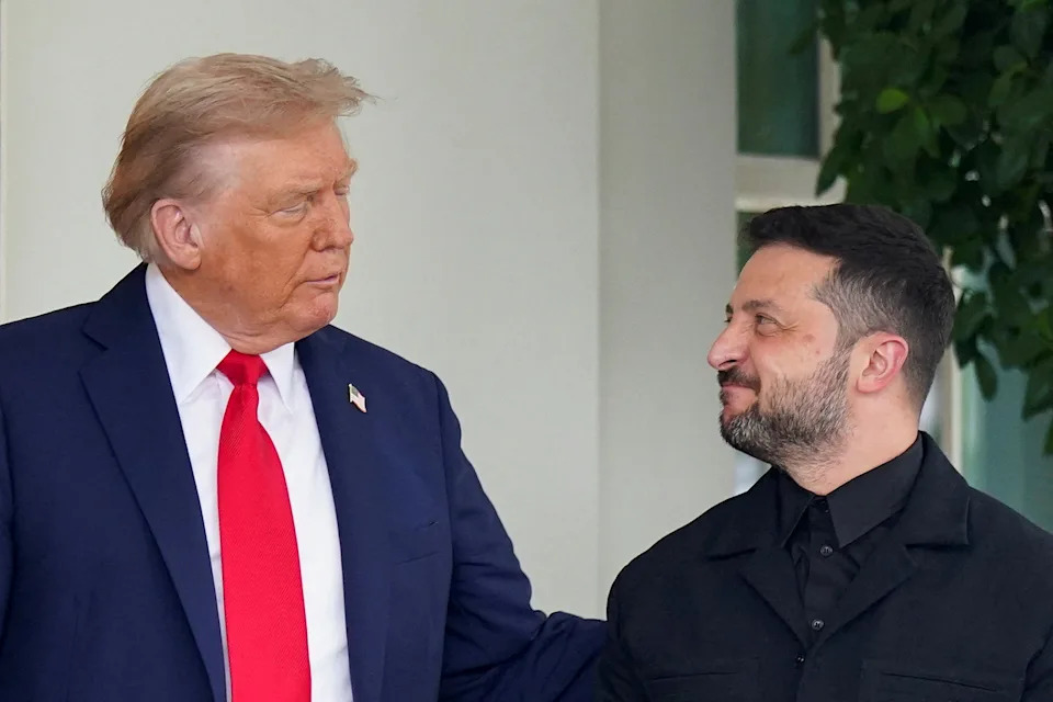 President Trump greets Ukrainian President Volodymyr Zelenskiy upon his arrival at the White House on Monday. (Alexander Drago /Reuters)

