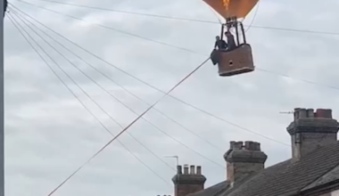 Hot air balloon lands in residential street