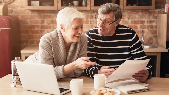A senior couple planning their retirement, general budget and finances.