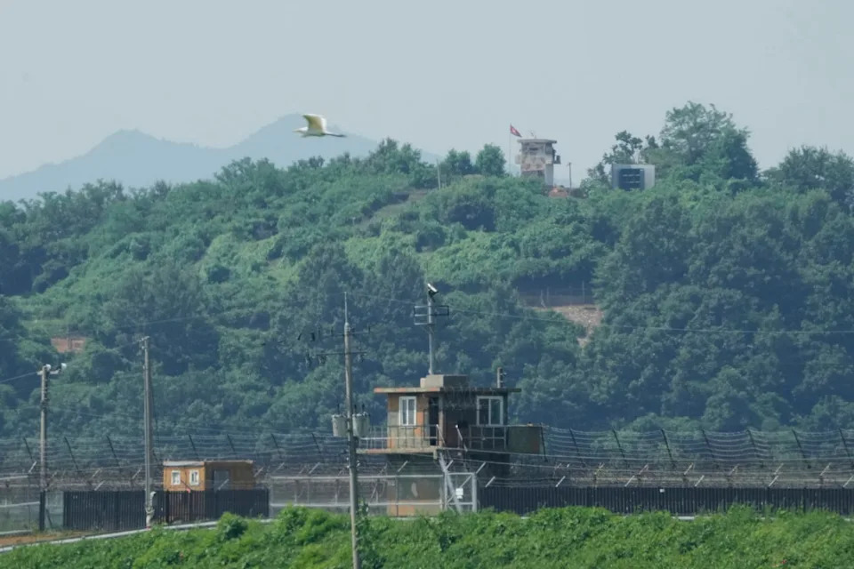 A North Korean military guard post, loudspeaker, top right, and South Korean military guard post, bottom, are seen from Paju, South Korea, near the border with North Korea (Associated Press)