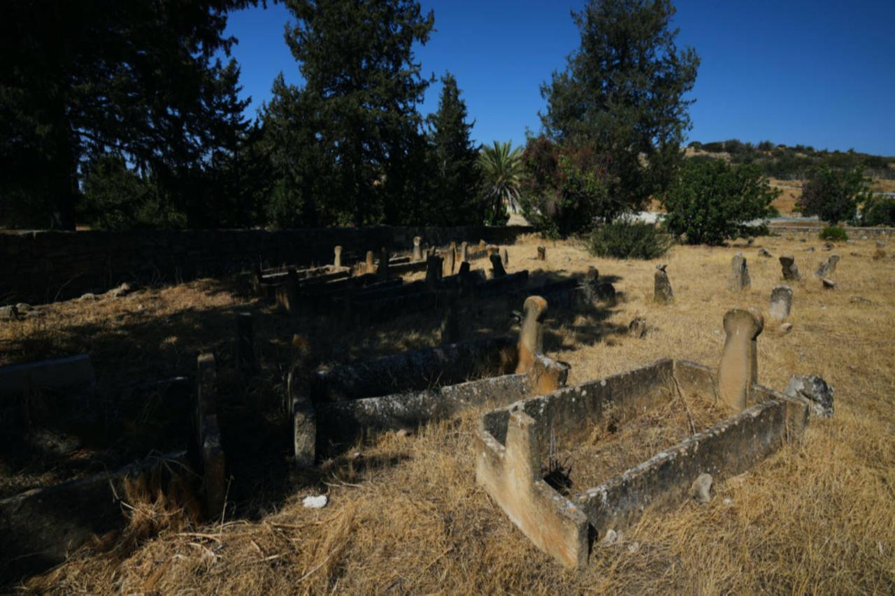 Cyprus leaders take rare step toward reconciliation through cemetery restoration