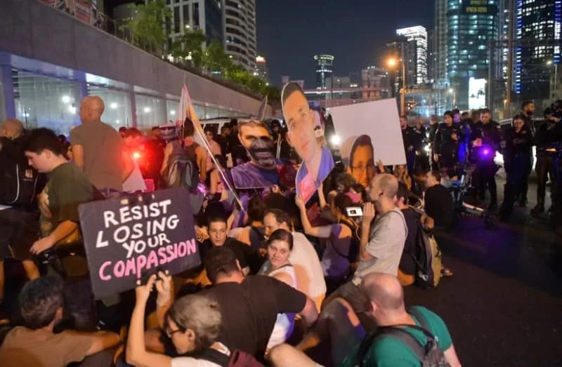 Protesters gather at the Ayalon Highway. (credit: AVSHALOM SASSONI)