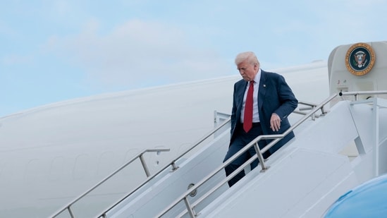 US President Donald Trump walks off Air Force One at the Lehigh Valley International Airport on August 01, 2025 in Allentown, Pennsylvania.(AFP)