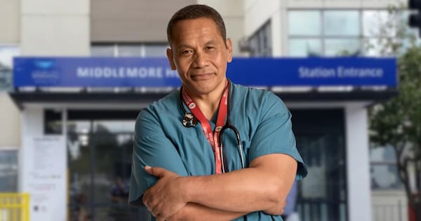 Why this Auckland doctor walks home in his scrubs