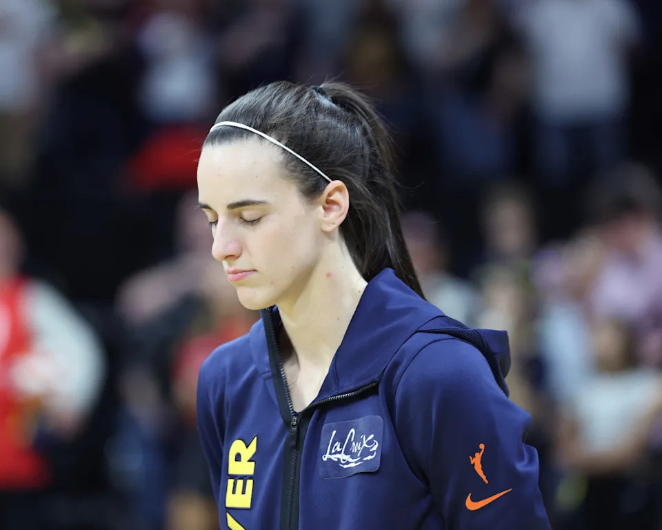 IOWA CITY, IA - MAY 4: Caitlin Clark #22 of the Indiana Fever stands for the National Anthem before the game against the Brazil Women's National Basketball Team during the WNBA preseason game on May 4, 2025 at Carver-Hawkeye Arena in Iowa City, Iowa. (Photo by Jeff Haynes/NBAE via Getty Images)Jeff Haynes&sol;Getty Images