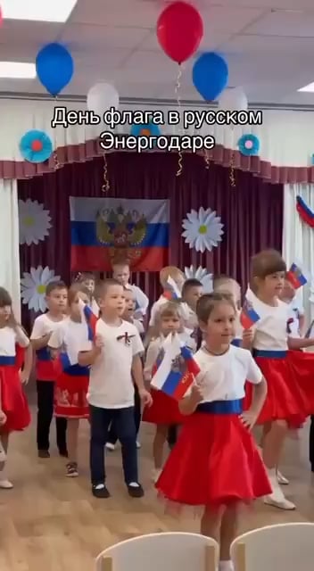 Footage of Ukrainian children in occupied Enerhodar obliged to praise the Russian Empire during the National Flag Day today.