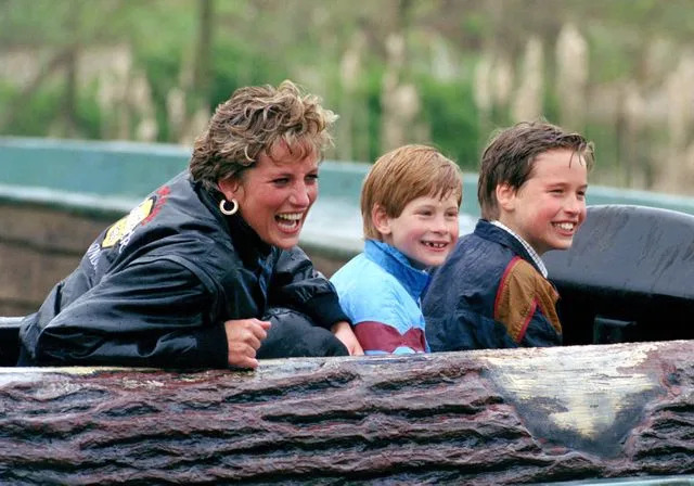 Getty Images Princess Diana with her sons Prince Harry and Prince William at an amusement park in 1993