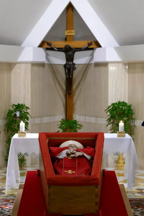 Getty Images The body of Pope Francis lies in state at the chapel of Casa Santa Marta in Vatican City - April 21 2025