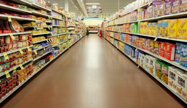 Americans could soon face higher inflation as businesses pass along tariff costs, Fed official says