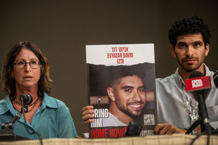 Galya David (L) and Ilay Yosef David (R), mother and brother of Evyatar David, at a press conference in Athens on November 6, 2023.