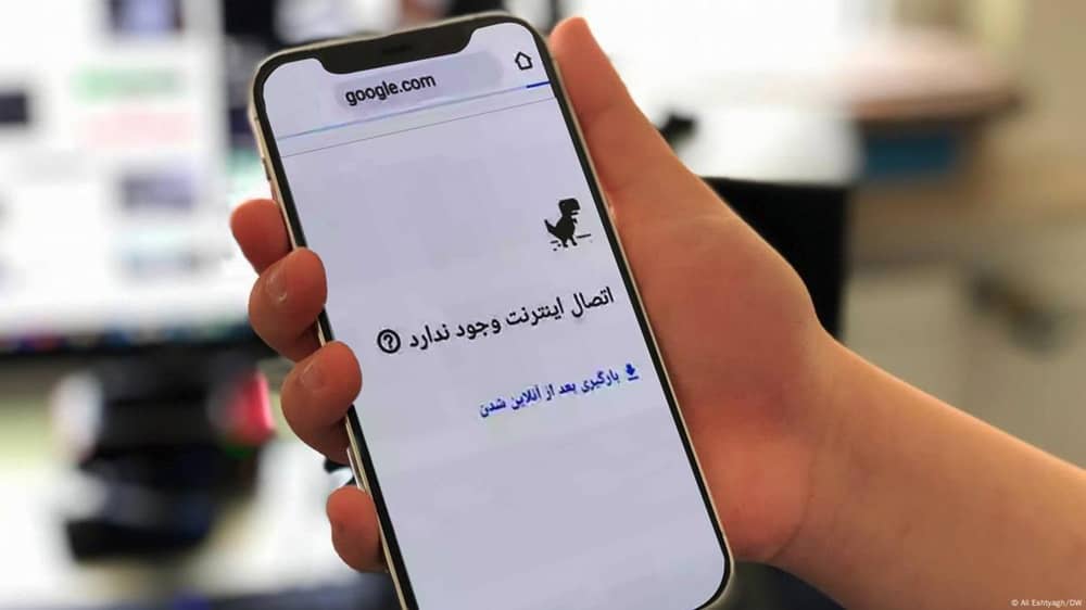 A mobile screen in Iran shows a “No Internet Connection” error