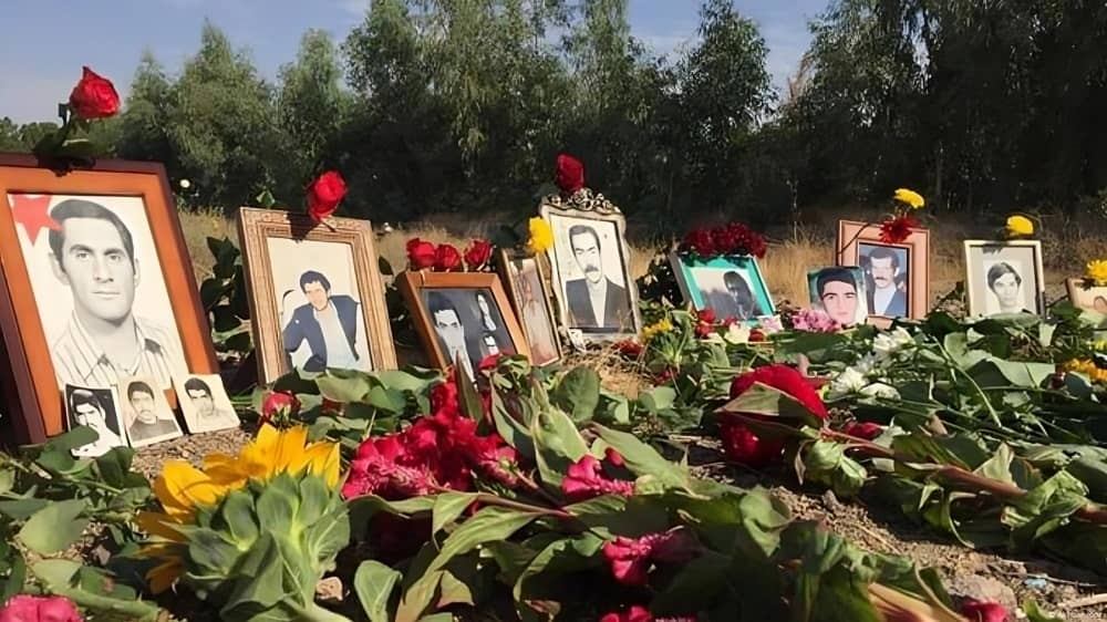 Families of 1988 massacre victims place flowers and photos at Khavaran, a site long known as the burial ground of the regime’s atrocities and fallen freedom fighters