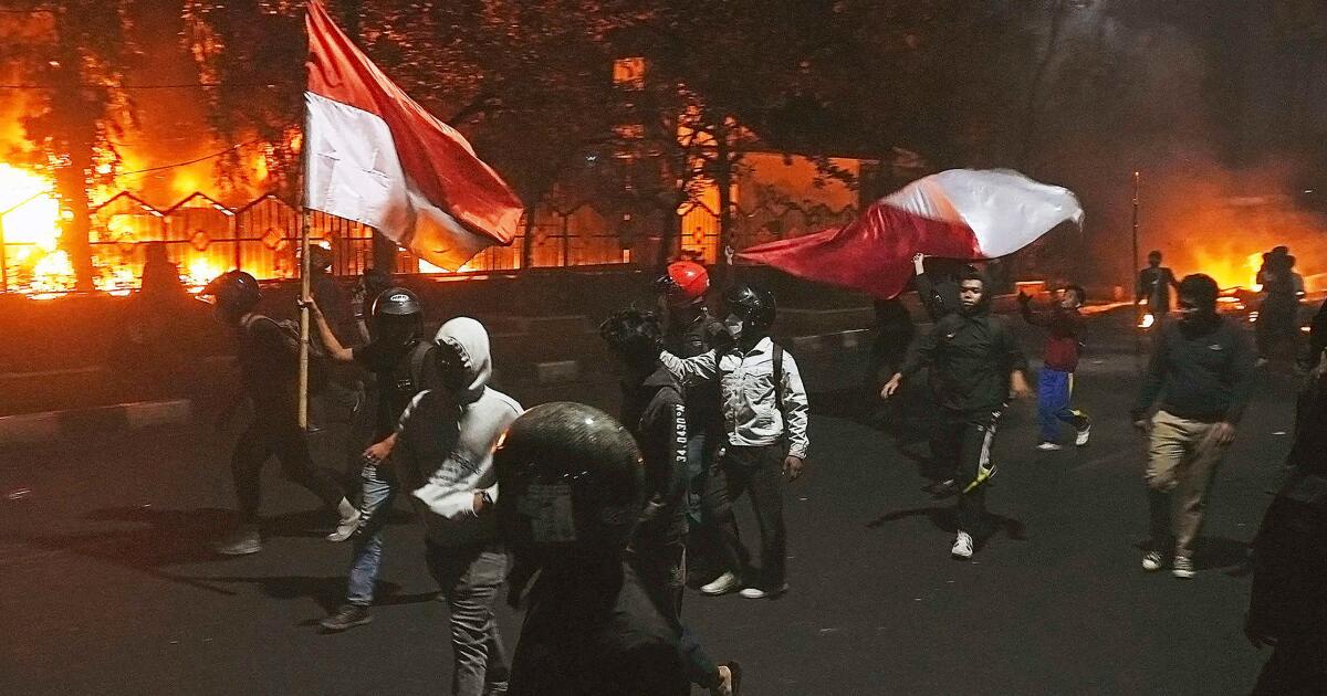 In Indonesia, protesters set fire to regional parliament building, leaving 3 dead