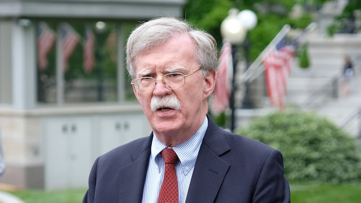 John Bolton speaks to the press
