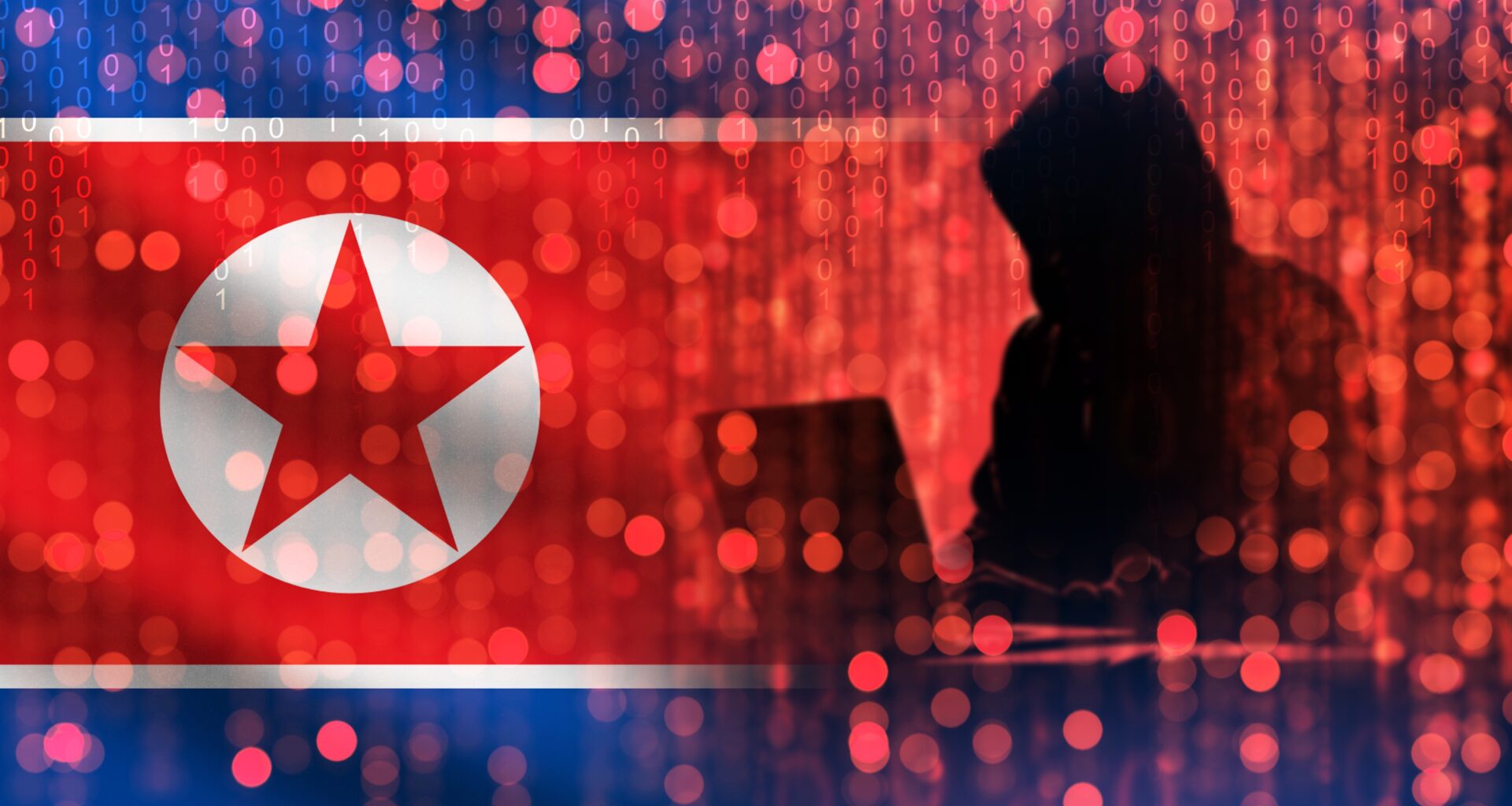 North Korean flag with a hooded hacker
