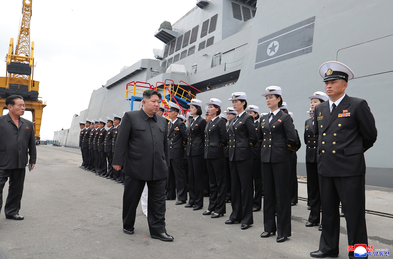 North Korean leader Kim Jong-un inspects the country's first 5,000-ton multipurpose destroyer, named the Choe Hyon, at a dockyard in the western coastal city of Nampho on Monday, to check the integrated operation test of the destroyer's weapons system and the training and lives of its sailors, in this photo released by North Korea s official Korean Central News Agency the next day. (Yonhap)