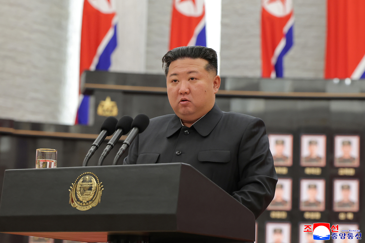 North Korean leader Kim Jong-un speaks during a ceremony in Pyongyang to award state commendations to commanders and combatants deployed to Russia's war with Ukraine and to comfort the bereaved families of fallen soldiers, in this undated photo released by the North's official Korean Central News Agency on Friday. (Yonhap)