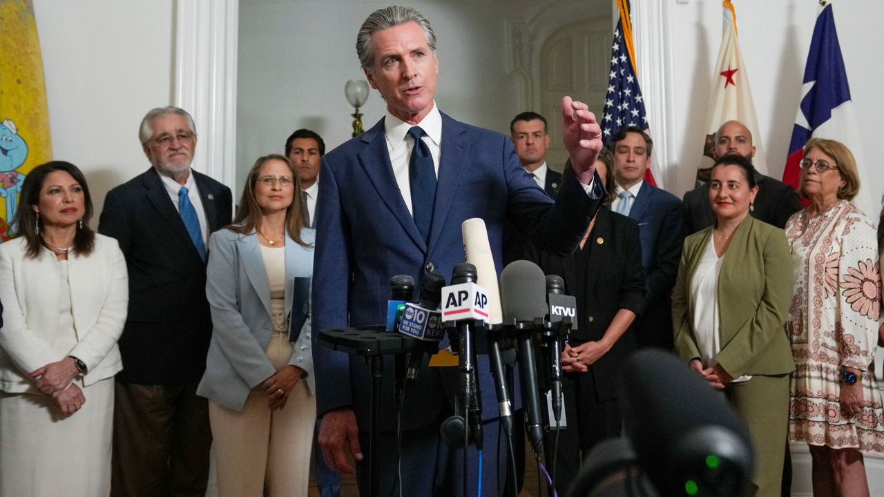 Accompanied by California and Texas lawmakers, California Gov. Gavin Newsom discusses the push to schedule a special election to redraw California's Congressional voting districts, during a news conference in Sacramento, Calif., Aug. 8 2025. (AP Photo/Rich Pedroncelli)