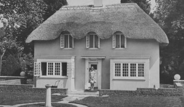 The future Queen Elizabeth in front of a playhouse gifted to her and Princess Margaret in 1932 by the people of Wales.