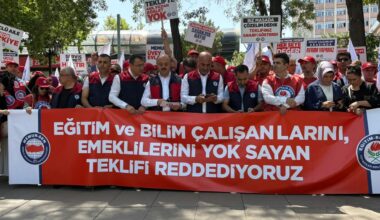 Members of Memur-Sen’s education and science workers’ union hold a banner reading ‘We reject the proposal that ignores education and science workers and retirees’ during a protest in Ankara, Türkiye, August 14, 2025. (IHA Photo)