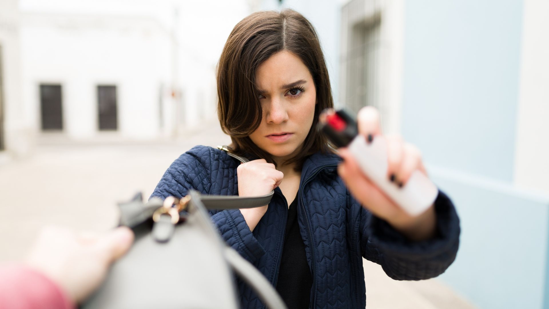 Person using pepper spray