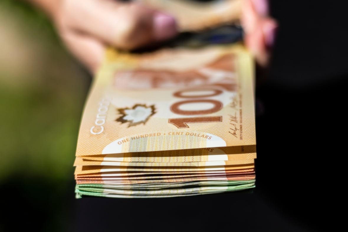 A stash of Canadian hundred dollar bills. 