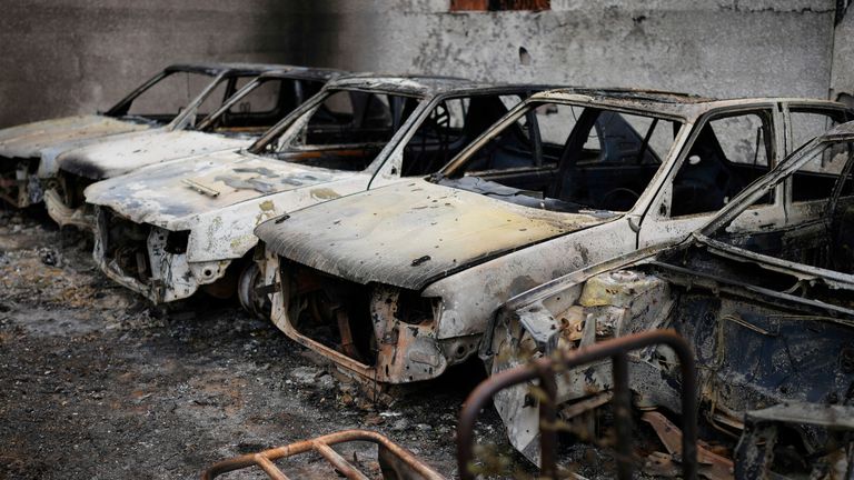 Charred cars near Saint-Laurent-de-la-Cabrerisse, southern France. Pic: AP