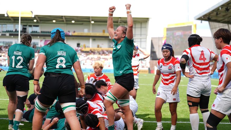 Ireland's Fiona Tuite (centre) celebrates after Ireland's Neve Jones (not pictured) scored their second try