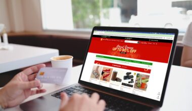 A person shops on Temu’s online marketplace using a laptop in Bangkok, Thailand, February 8, 2025. (Adobe Stock Photo)