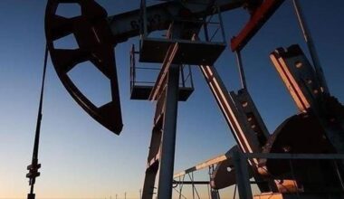 Price slump wipes out over $24 billion of first-half profits for oil giants