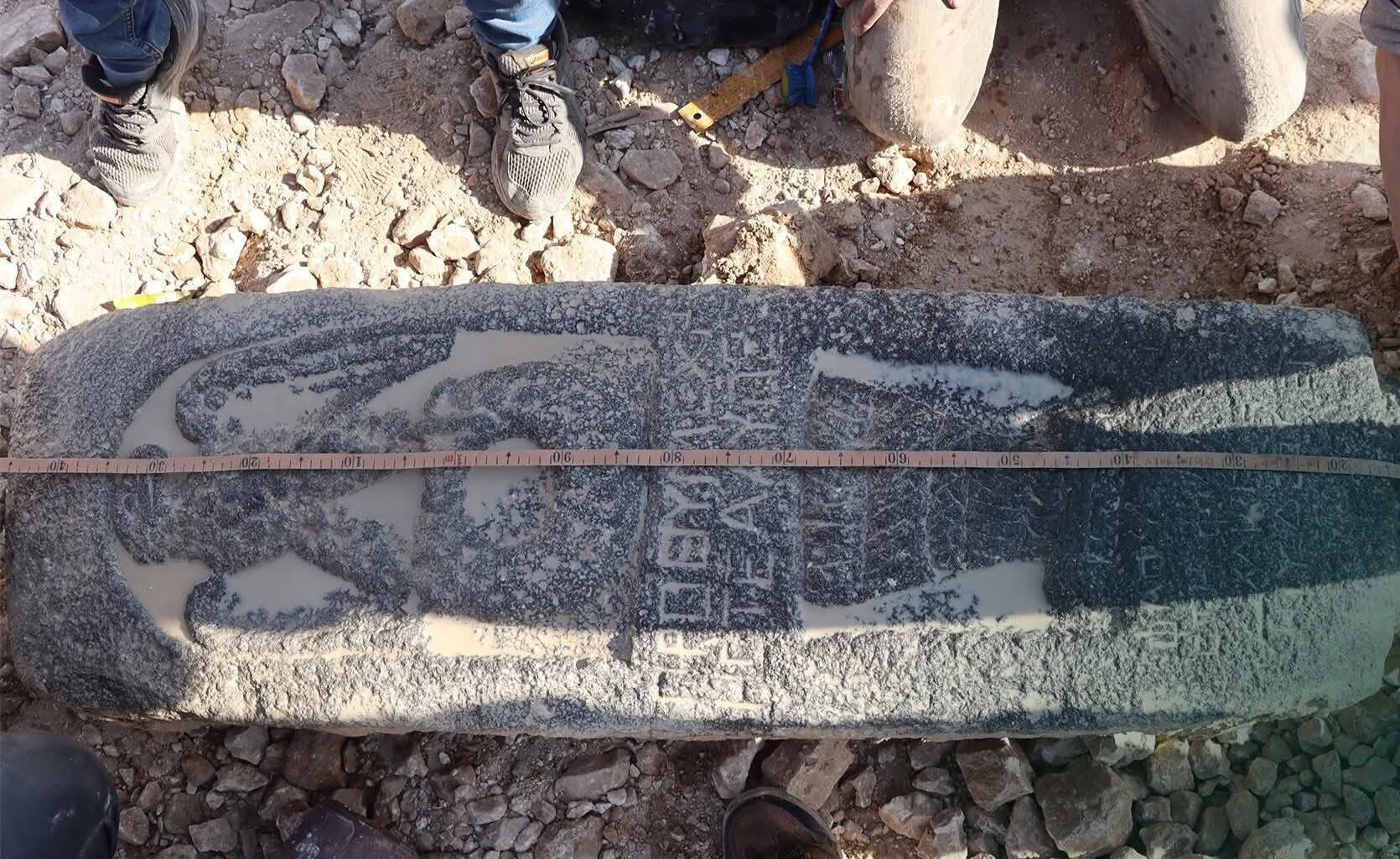 Stele discovered with a carved eagle and Greek inscription 