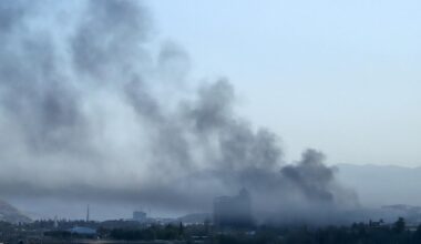 Smoke billows over a neighbourhood of Sulaymaniyah, after security forces arrested opposition figure Lahur Sheikh Jangi, following several hours of armed clashes on August 22, 2025. (AFP Photo)