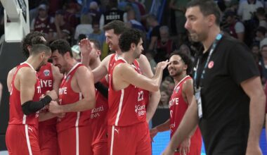 Players of Türkiye celebrate victory at the end of the FIBA EuroBasket 2025 Group A 1st week match between Latvia and Türkiye, Riga, Latvia, August 27, 2025. (AA Photo)