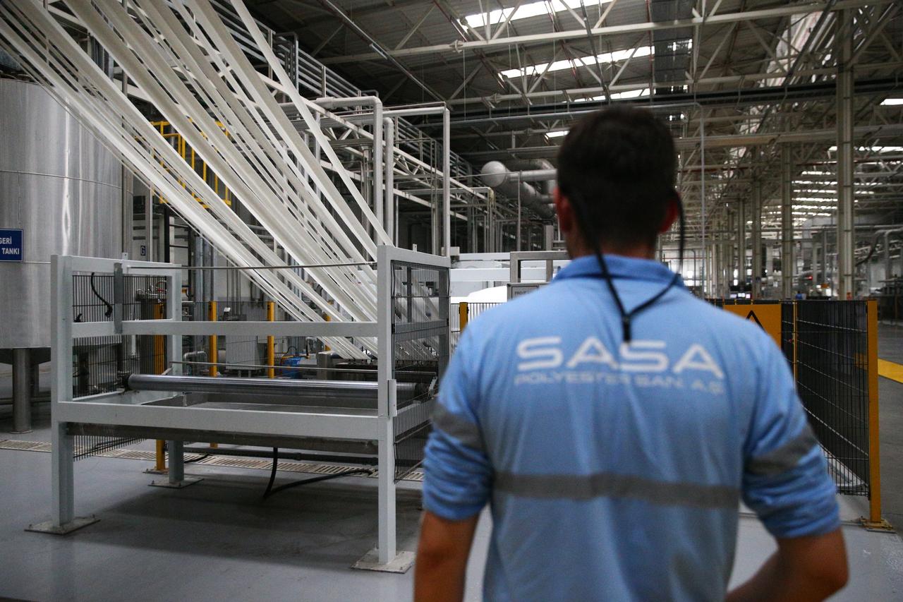 A SASA Polyester employee works inside the company’s production facility in Adana, Türkiye, August 26, 2025. (AA Photo)
