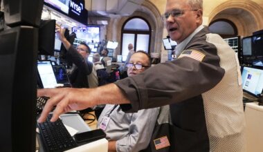 Wall Street rallies and the Dow soars 900 points on hopes for lower interest rates
