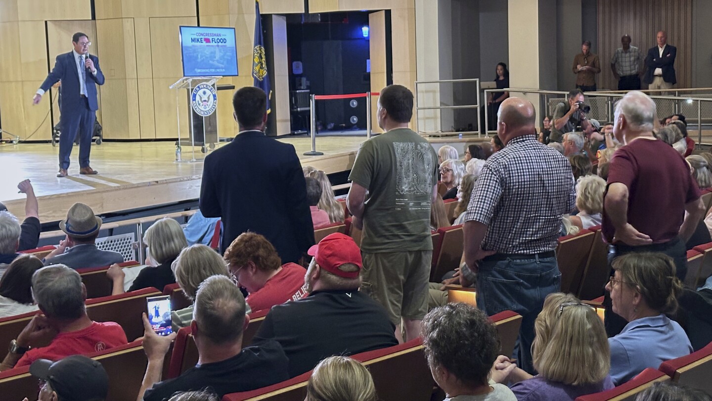 Republican Flood jeered over Trump tax bill at Nebraska town hall