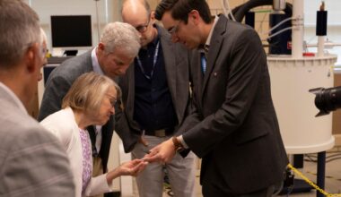 U.S. Energy Secretary, in Iowa, says federal support to continue for Ames lab, but not wind energy i