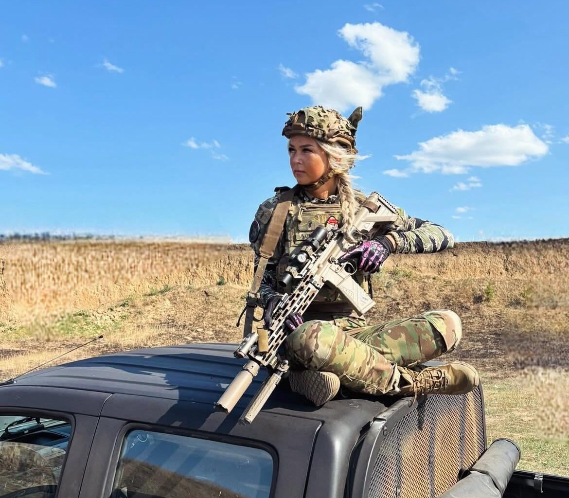 Estonian volunteer with a suppressed rifle - she is a member of the 2nd Special Purpose Detachment (Vladyslav Peleshenko) detachment) - which is a special operations unit, within the Main Directorate of Intelligence of Ukraine (HUR - GUR).