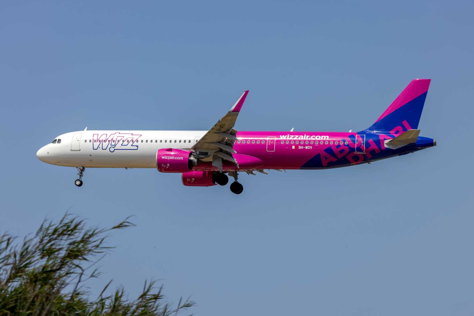 Wizz Air Abu Dhabi Airbus A321neo landing at MLA shutterstock_2323031759