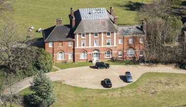 Two families vacate cottages next to eight-bed Windsor mansion with tennis court and ballroom to make way for the Waleses (they were given another place to live)